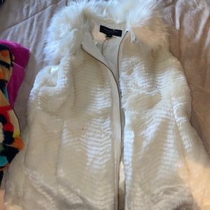 White faux fur vest